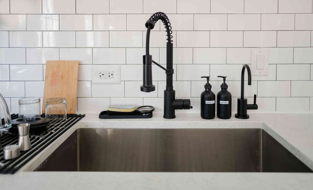 Kitchen Sink With White Subway Tiles 1285436811 C7aea727a76f46098f5e7407894304d2.jpg